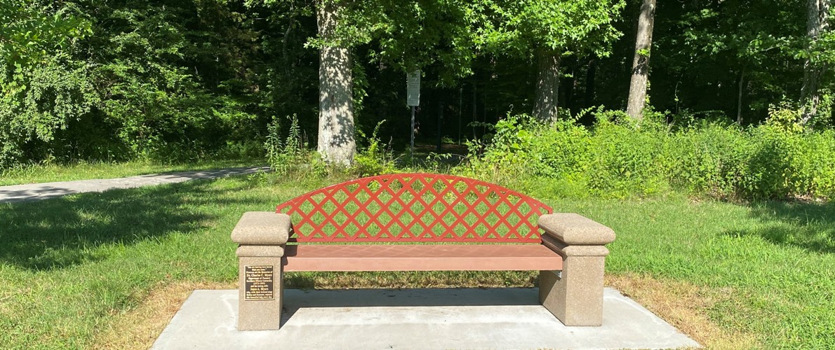 Boardwalk Tribute Bench by Campus Lake